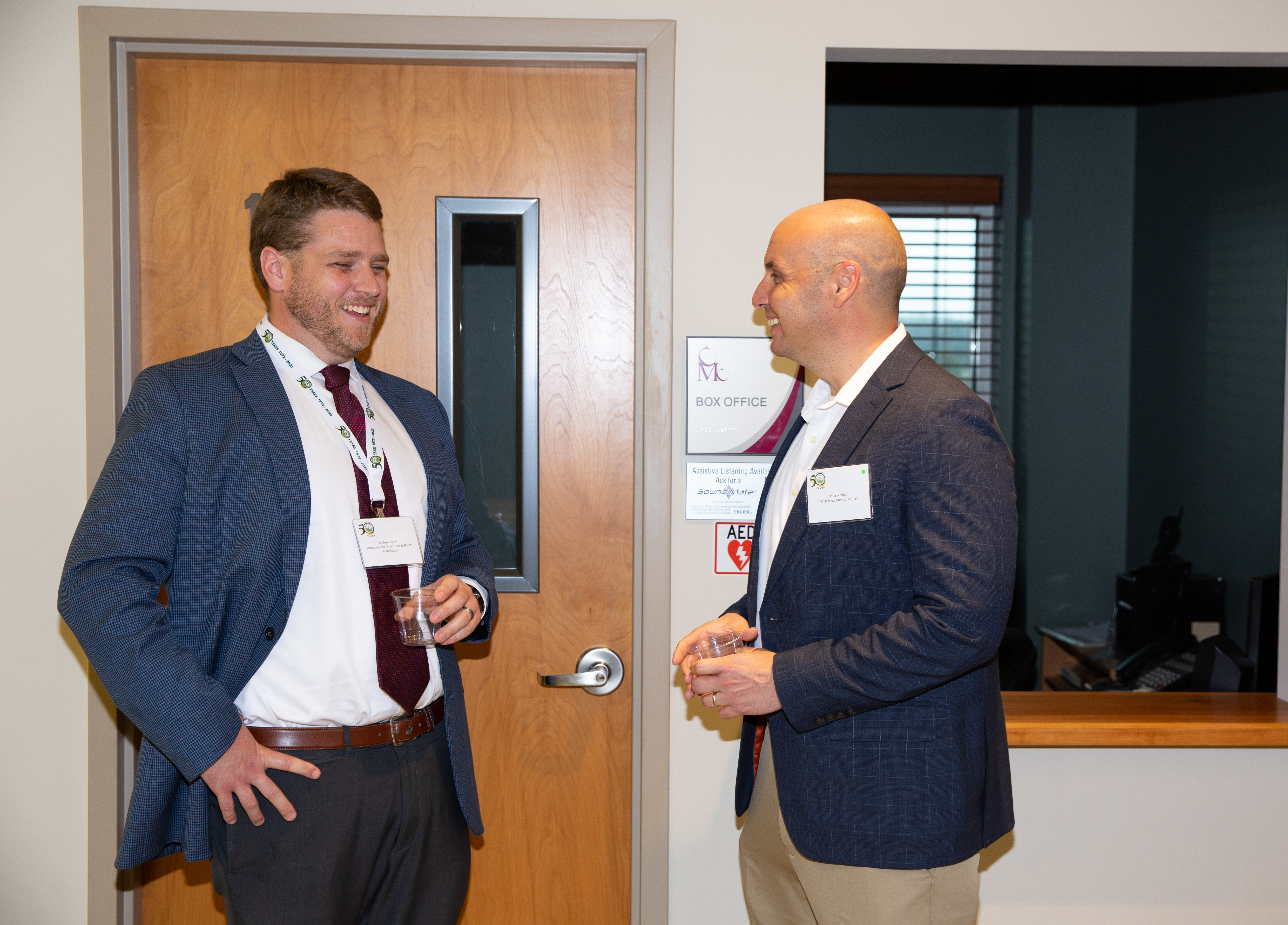 CEO of PMC, Joshua Wedge speaking to Foundation Director Andrew Ickes 