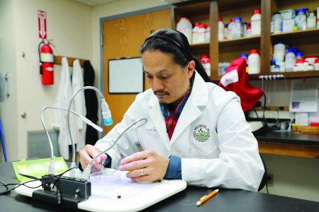 Shinichi Asano, Ph.D., in his lab at WVSOM