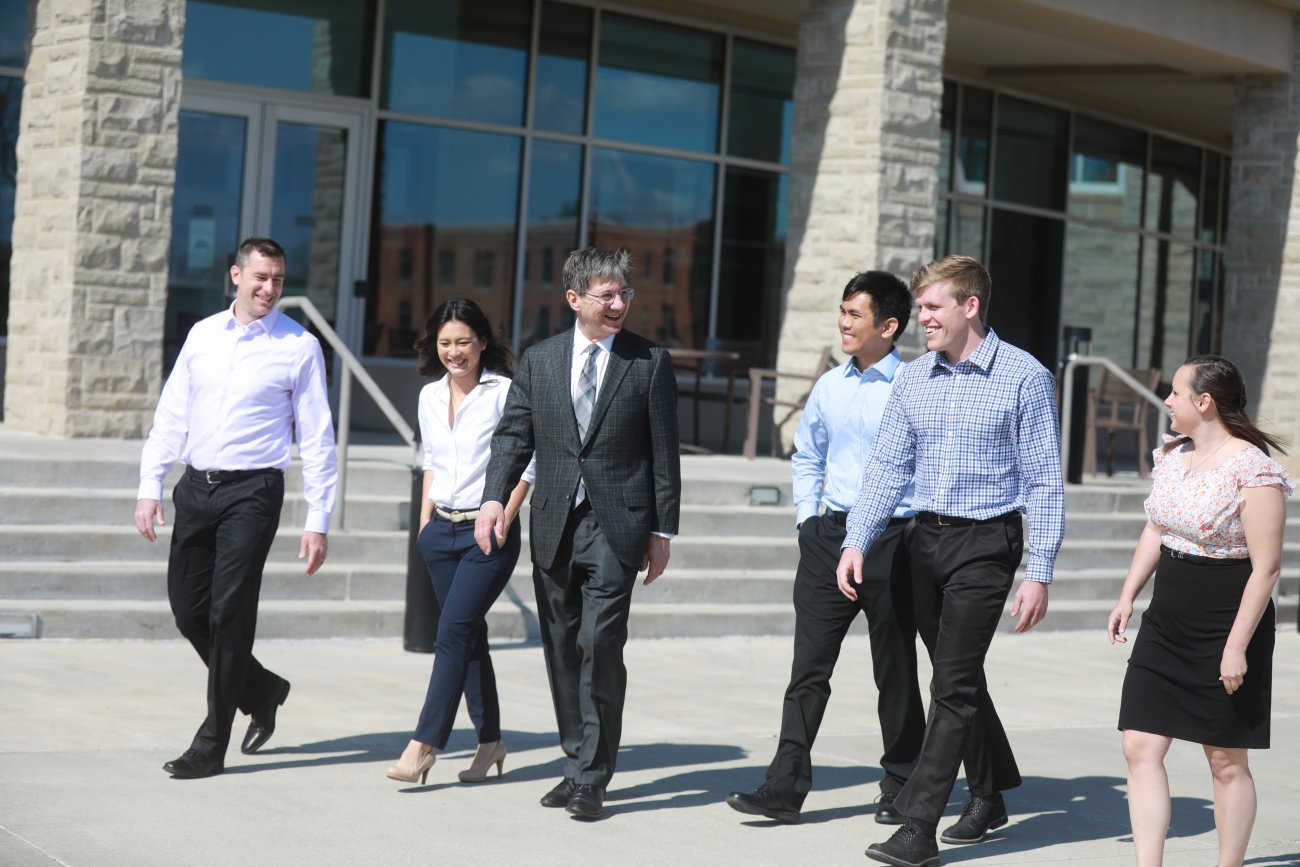 Dr. Nemitz walking with students