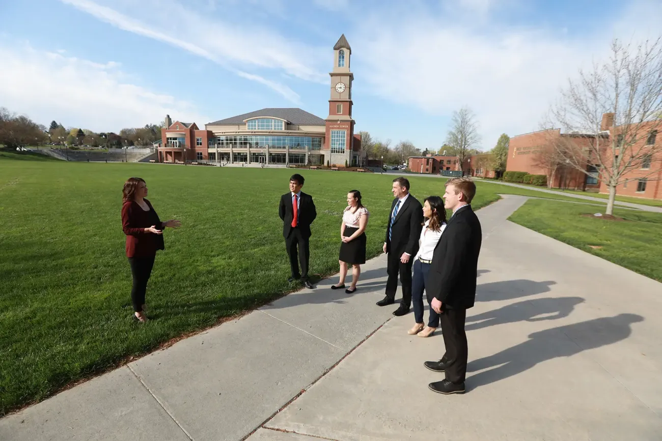 Students on campus tour with WVSOM clock tower in background