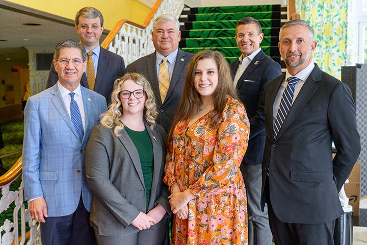 The Health Plan scholarship recipients with officials