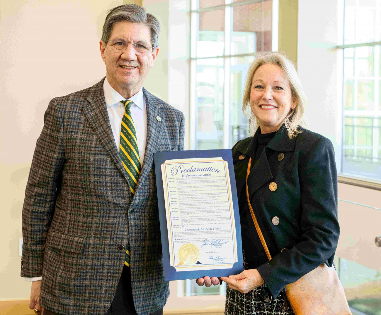 President James Nemitz and Penny Fioravante with proclamation