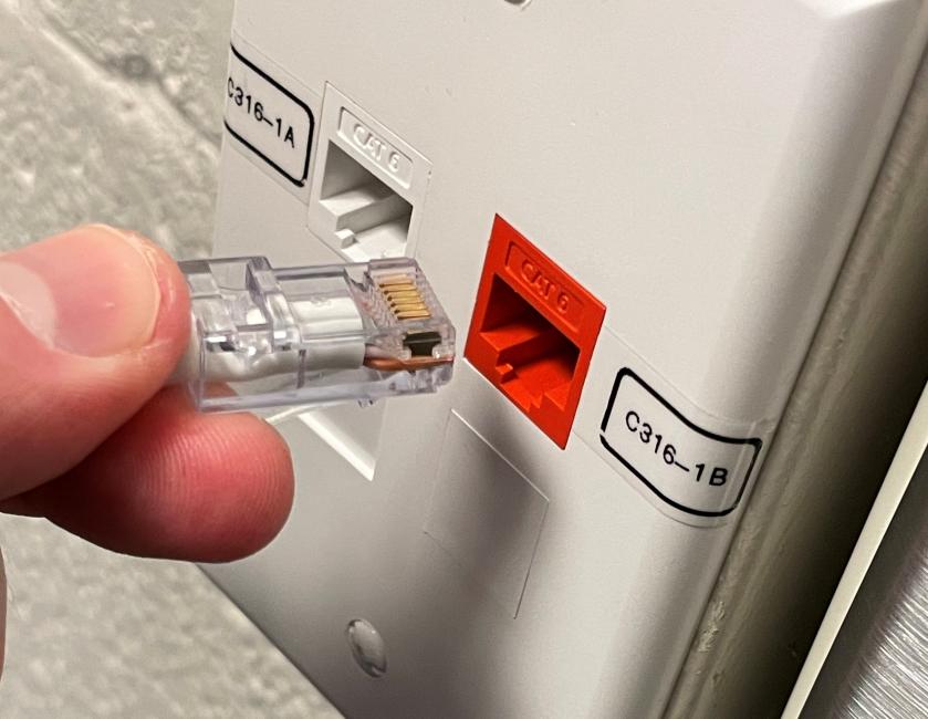 ethernet cable going into CAT 6 RJ-45 port